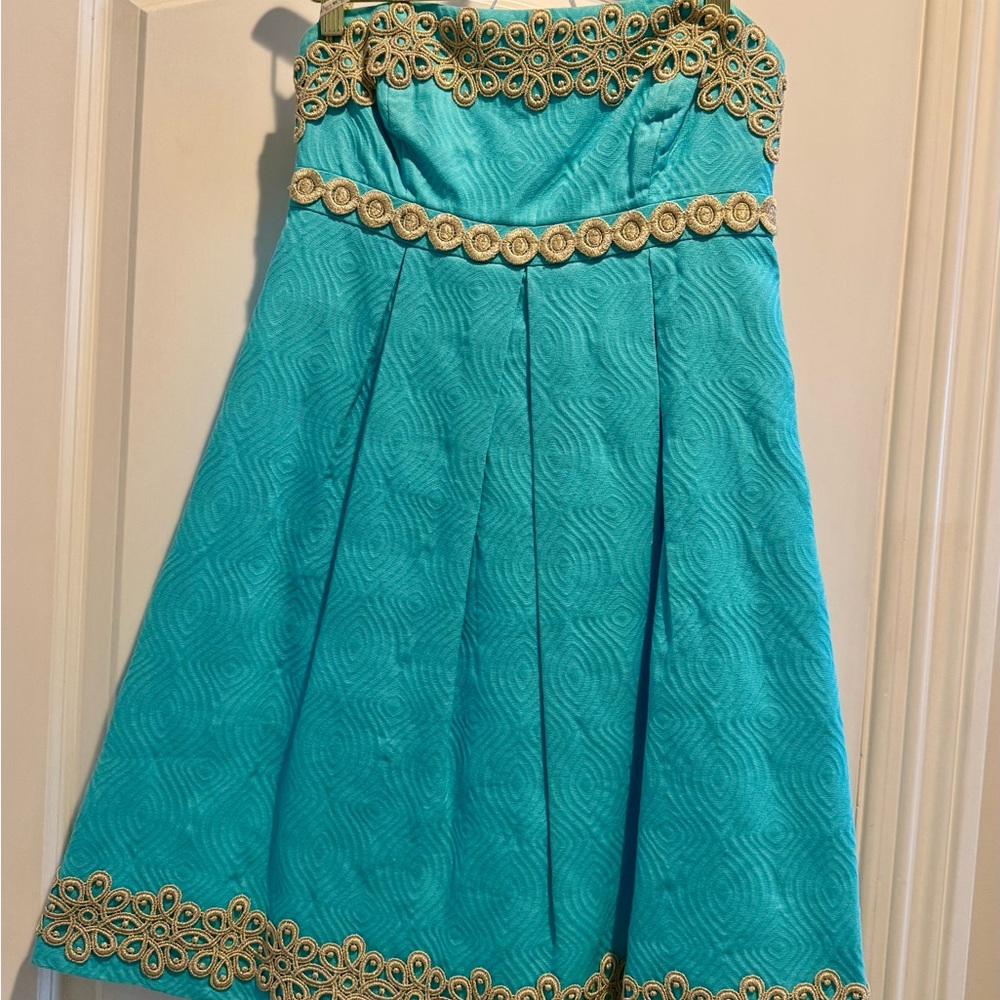 Turquoise Dress with Gold Accents